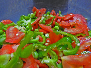 chopped raw carrot capsicum tomato green pee