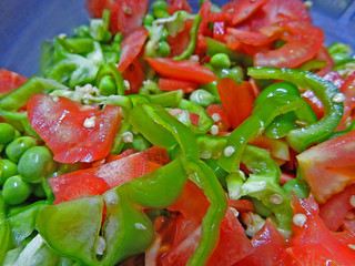 chopped raw carrot capsicum tomato green pee