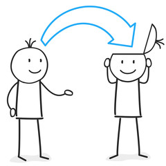 Person gibt der anderen Input und Hilfestellung