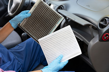 Replacement of cabin pollen air filter for a car - obrazy, fototapety, plakaty