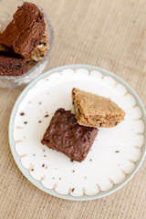 brownie and butterscotch on a plate flatlay