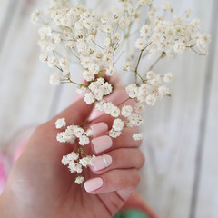 hand with cherry blossom