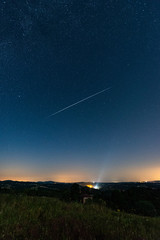 Perseid Meteor Shower. Falling Star at Dark Sky. Night of Shooting Stars