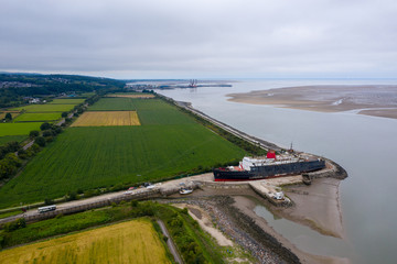Mostyn Docks, River Dee, North Wales, UK. TSS Duke of Lancaster abandoned railway steamer ship docked in Mostyn Docks, River Dee, North Wales