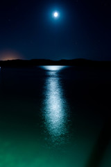 Naklejka na ściany i meble Wonderful night view of the sea,moon light reflection.