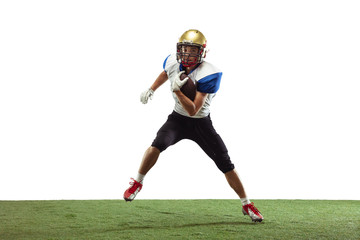 Fototapeta na wymiar In action. American football player isolated on white studio background with copyspace. Professional sportsman during game playing in action and motion. Concept of sport, movement, achievements.