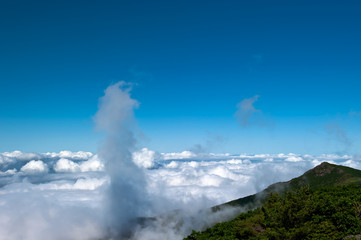 Wonderful and curious sea of clouds at beautiful mountain landscape.