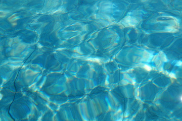 blue pool water for background close up