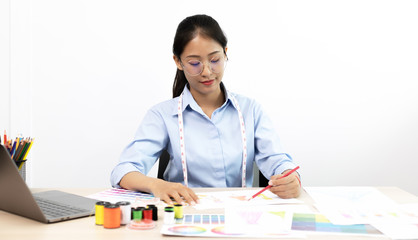 Asian fashion designers are creating new styles of clothing to match the modern era.