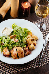 grilled chicken breast with lettuce and garlic sauce