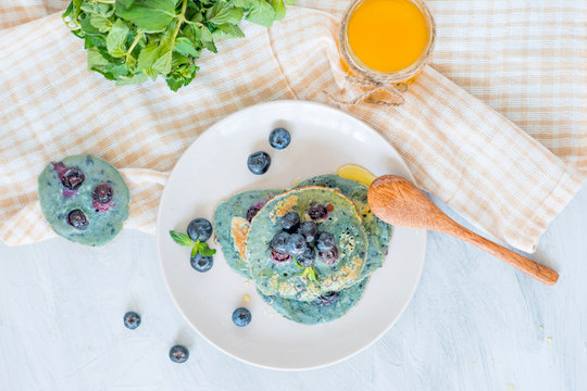 pancakes with blueberries and honey, blue food
