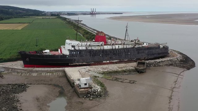 Mostyn Docks, River Dee, North Wales, UK. TSS Duke of Lancaster abandoned railway steamer ship docked in Mostyn Docks, River Dee, North Wales