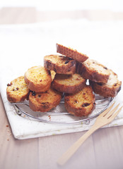 Garlic bread is on the table.
