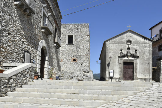 A narrow street among the old houses of Aieta, a rural village in the Calabria region.