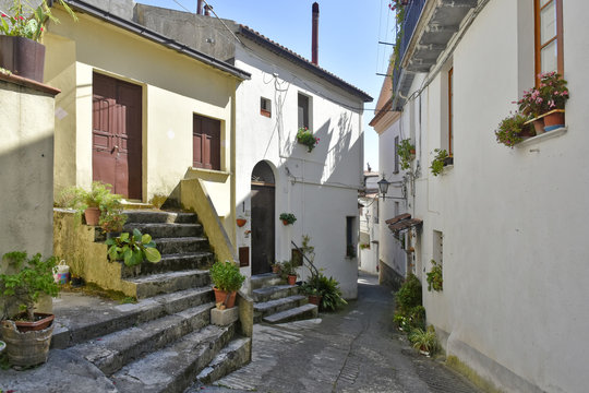 A narrow street among the old houses of Aieta, a rural village in the Calabria region.
