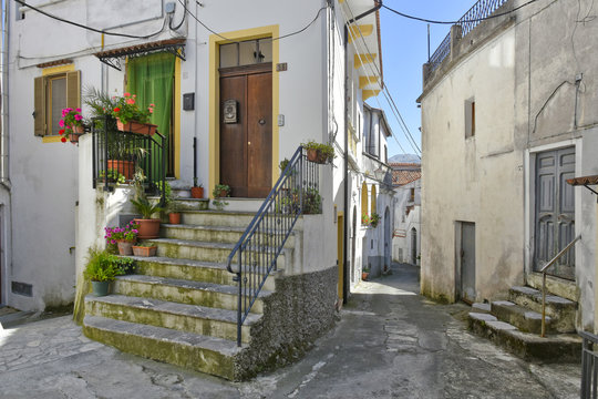 A narrow street among the old houses of Aieta, a rural village in the Calabria region.