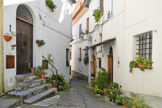 A narrow street among the old houses of Aieta, a rural village in the Calabria region.