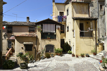 A narrow street among the old houses of Altomonte, a rural village in the Calabria region.
