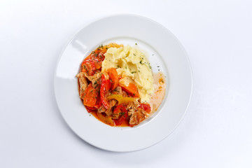 mashed potato with meat and vegetables