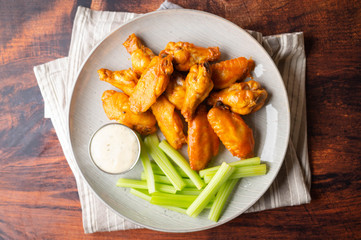 buffalo wings with celery and ranch dressing