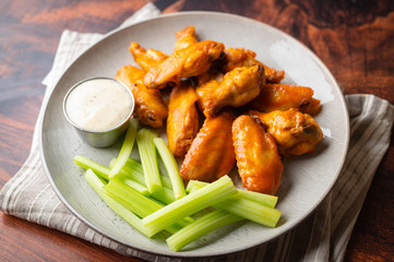 buffalo wings with celery and ranch dressing