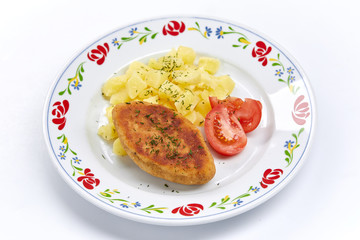 cutlet with mashed potato on white plate