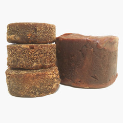 different brown sugar (gula merah) dan palm sugar (gula aren) isolated on white background