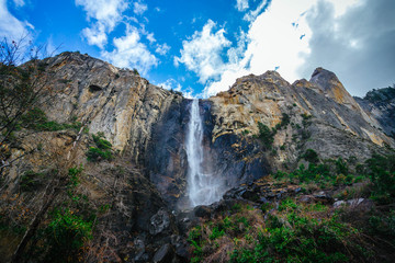 Closeup view of Yosemite Falls against a blue sky in Yosemite National Park