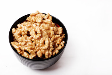 Walnut In Bowl Isolated On White Background.