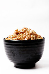 Walnut In Bowl Isolated On White Background.