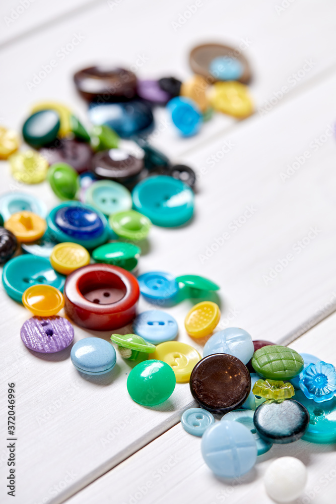Aufkleber Background and texture of multicolored antique buttons