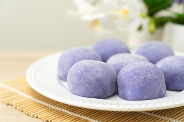 Fototapeta na wymiar Purple color taro or yam mochi japanese dessert