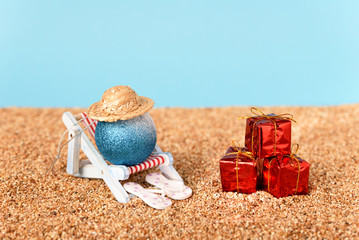 Christmas presents on the beach by the sea, christmas in warm countries.