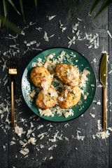 Baked stuffed potatoes with cheese and bacon