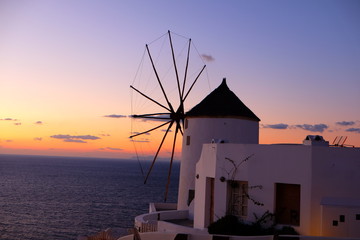 windmill in oia santorini greece