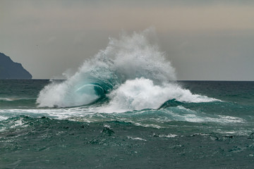 Waves crashing on the headlands on the north shore of Kauai, Hawaii.