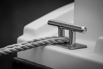 A Rope Around a Cleat on a Boat - Black and White