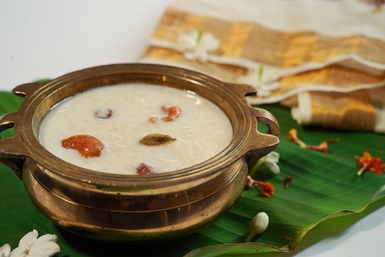 Rice Pudding / Kerala Onam special Paal/ Pal  payasam served in a traditional brass vessel