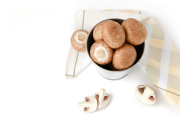 fresh beige cultured mushrooms on a white background. Vegan and vegetarian food. concept of the harvest season.