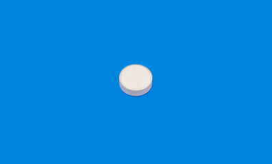 White pill on blue background. Bright pill on indigo background. White seamless pattern and green pill.