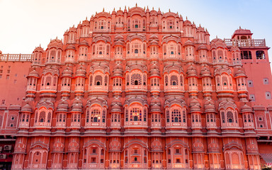 Fototapeta na wymiar Hawa Mahal 'Palace of Winds or Breeze' is a palace in Jaipur, India. Its cultural & architectural heritage is a true reflection of fusion of Hindu Rajput architecture & Islamic Mughal architecture.