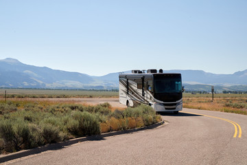An RV parked in Jackson Hole Wyoming - obrazy, fototapety, plakaty