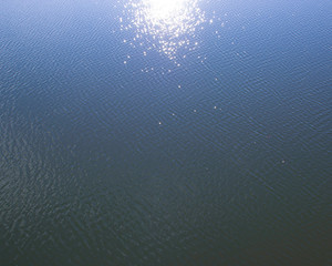 
Ripples on the water in the reflection of the sun