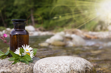 Banner of Essential oils in glass bottles.