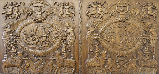 Carved wood paneling of hope chest