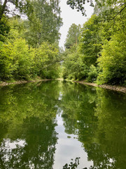 Secluded river in forest
Find a river, rent a boat, travel through the river and find most abandoned places.