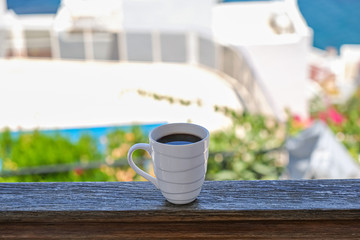 coffee cup coffee cups in wooden balcony terrace with sea view
