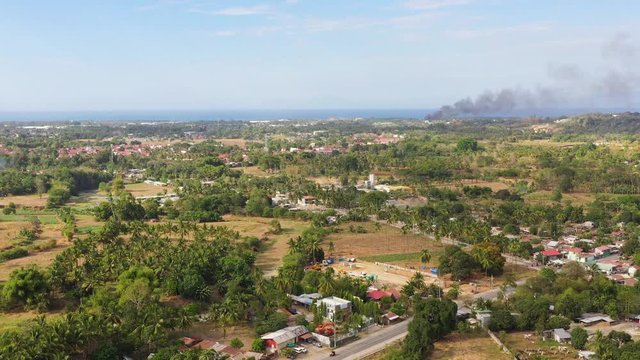The modern city of Cagayan de Oro with a seaport, skyscrapers and buildings. Mindanao, Philippines.
