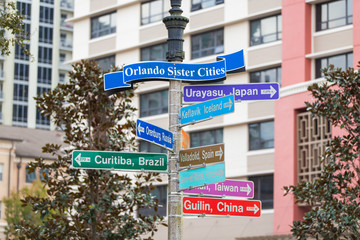 directions during stroll through downtown Lake Eola on Orlando Florida on a fall winters afternoon on a weekend day.  stock photo royalty free  © Tamara Sales 