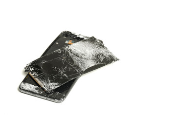 broken smartphone on a white background